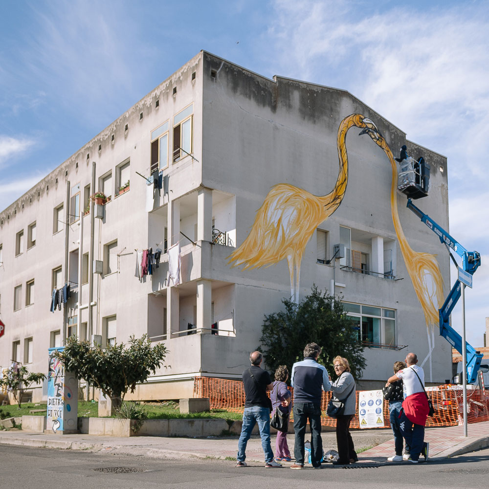 Is Murusu è un progetto di rigenerazione urbana di un quartiere di edilizia popolare attraverso la leva artistica che ha coinvolto sette artisti e si è svolto in tre mesi di lavori